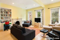Charming Gowanus Brick Row House: Marble Mantels, Cozy Living for $2.45 Million