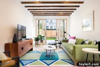 Greenpoint Row House Masterfully Triples in Size Without Losing Its Iconic Curb Appeal