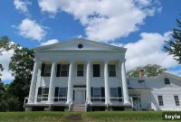 Own a Greek Revival Learning Oasis for Women Professionals Under a Million