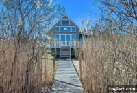 North Fork Waterfront Gem: Turnkey Living with Sweeping Views and Private Deepwater Dock