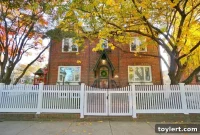 Marine Park Tudor Treasure: Original Kitchen, Attached Garage, Yours for $924,900