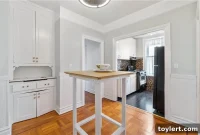 Midwood Spanish Eclectic Gem Sunrooms Pink Baths Garage $1.499 Million