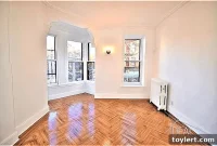 Park Slope Oasis: Two-Bedroom with Designer Finishes and Bay Window for $3,500
