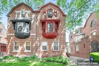 Crown Heights Architectural Gem: Gambrel Roof Townhouse with Oriel Window, Garage, $2.499 Million
