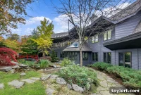 Modernist Masterpiece by Wright Protégé Featuring Grand Ceilings and a Private Oasis