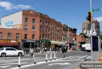 Plaque Blasts Housing Crisis on Vacant Luxury Clinton Hill Building