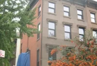 A Historic Transformation: Passive House Reno Sheds Scaffolding