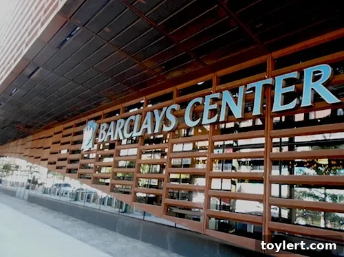 Noise Complaints Lead to Fine for Barclays Center 2 Barclays Center'ın dış görünümü, gökyüzüne uzanan modern mimarisiyle dikkat çekiyor. Arena, etrafındaki konut binaları ve kentsel yaşamla çevrili.