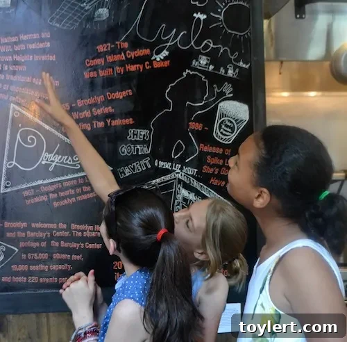 Park Slope Wine Bar Gets a Vibrant Makeover by Young Artists 2 A vibrant mural depicting key historical moments and figures of Brooklyn, created by young artists, displayed prominently at Terroir Park Slope.