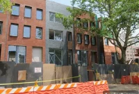 Copper Facade Marks Final Stretch for 9 Townhouses