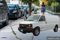 Unmarked Van Man Saws My Sidewalk