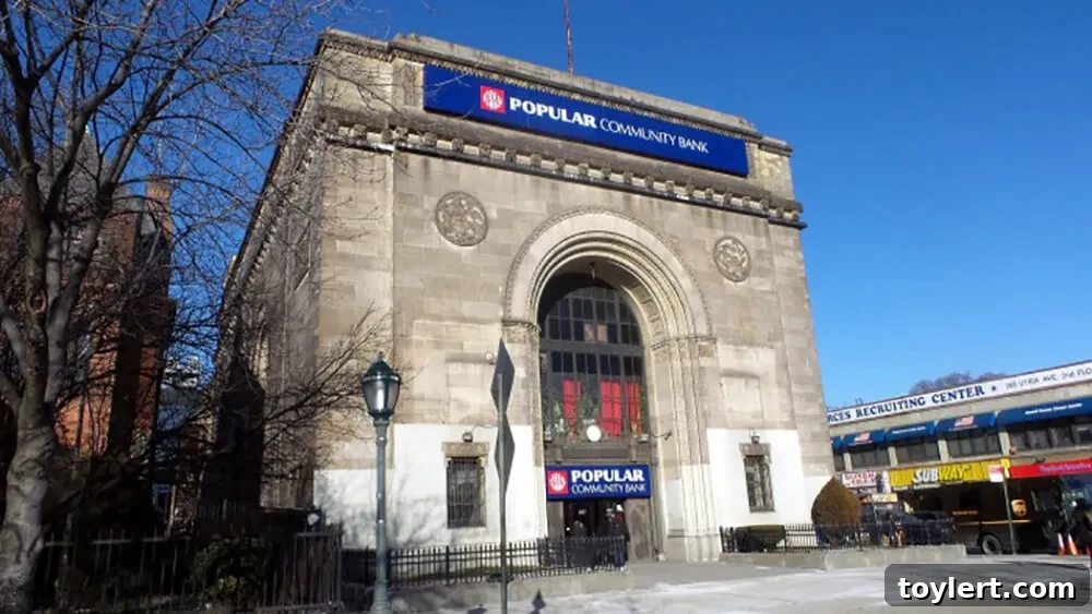 Art Deco Bank in Crown Heights Puts on its Game Face for Modell's 2 The grand Art Deco facade of the former East New York Savings Bank building on Eastern Parkway, now featuring newly installed Modell's Sporting Goods signage, located in the historic Crown Heights North neighborhood of Brooklyn.