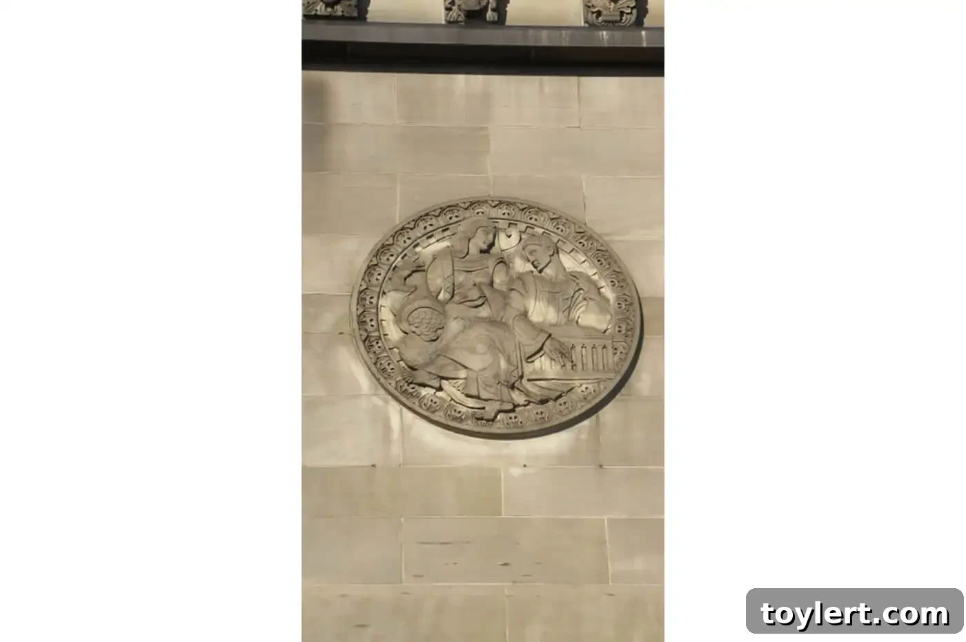 Art Deco Bank in Crown Heights Puts on its Game Face for Modell's 3 An exquisitely detailed close-up of the Art Deco ornamentation adorning the historic East New York Savings Bank building facade in Crown Heights, Brooklyn, soon to house Modell's Sporting Goods.