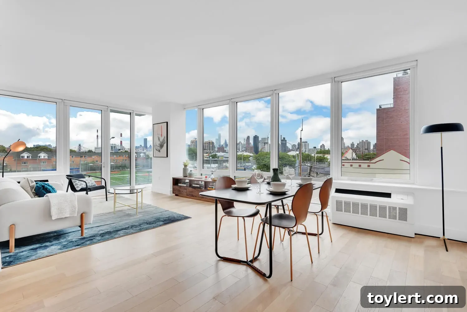 Spacious living room with modern design in an Astoria apartment at 1401 Broadway
