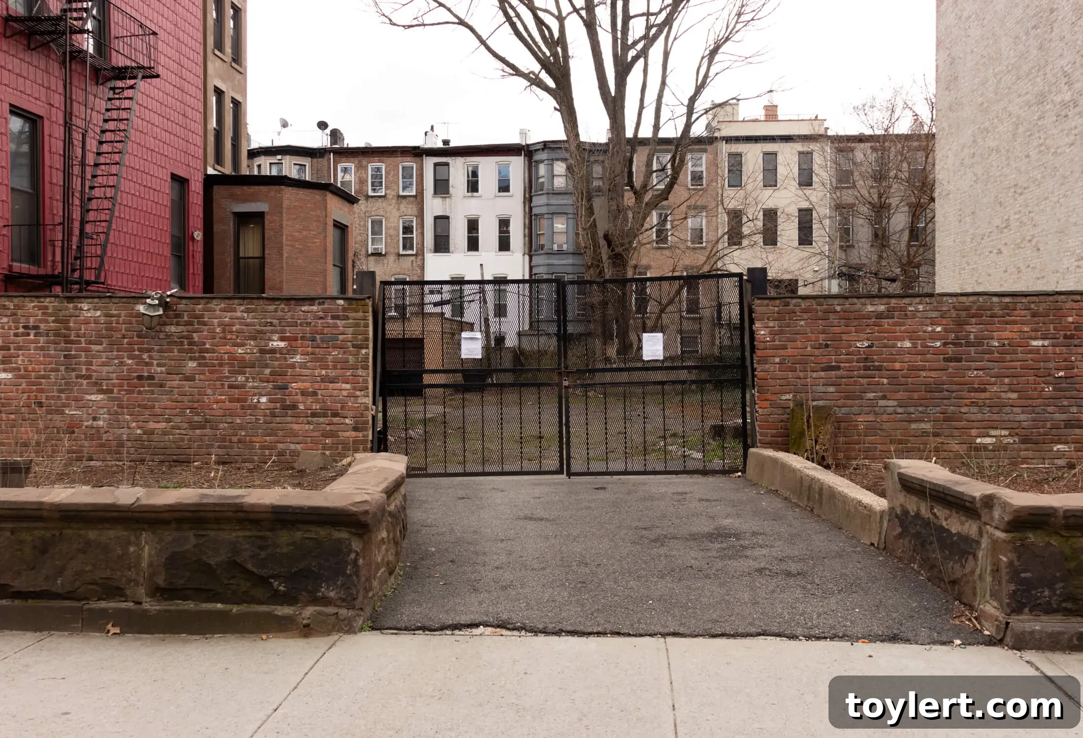 gates in front of the vacant lot