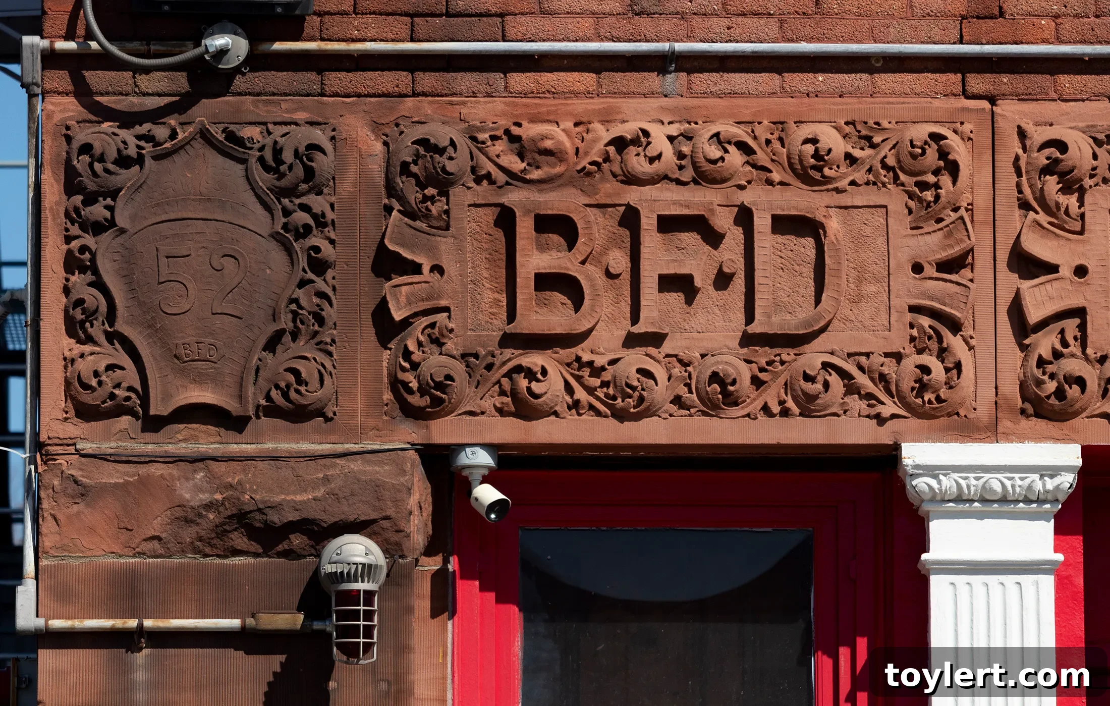 Exquisite terra cotta details on a historic Brooklyn fire station facade