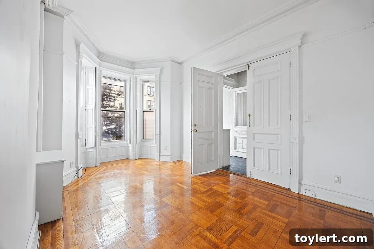 An Italianate Gem in Clinton Hill and More Starting at 1.75 Million 3 Bright and airy parlor with pristine white walls and elegant trim